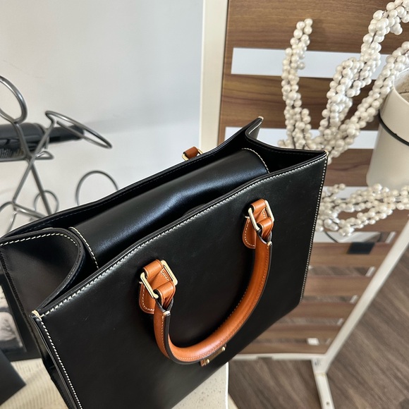 Dooney & Bourke Black and Tan Leather dress bag. - Picture 4 of 9